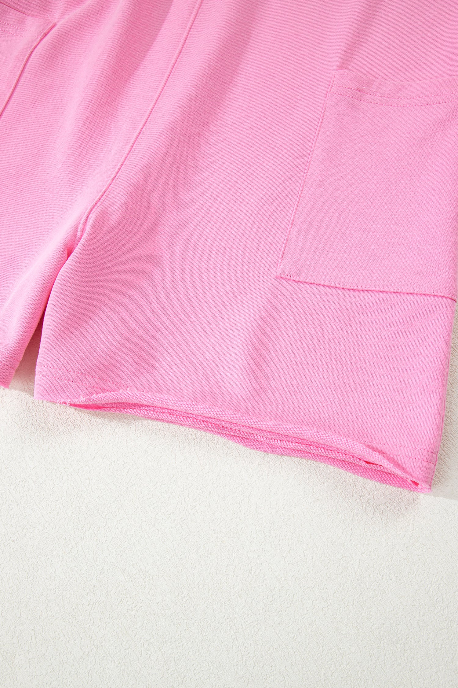 Pink Solid Color Raw Edge Half Sleeve Pocketed Loose Romper