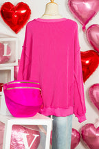 Strawberry Pink Twisted Ribbed Long Sleeve XOXO Bow Print Embroidered Patch Graphic Top