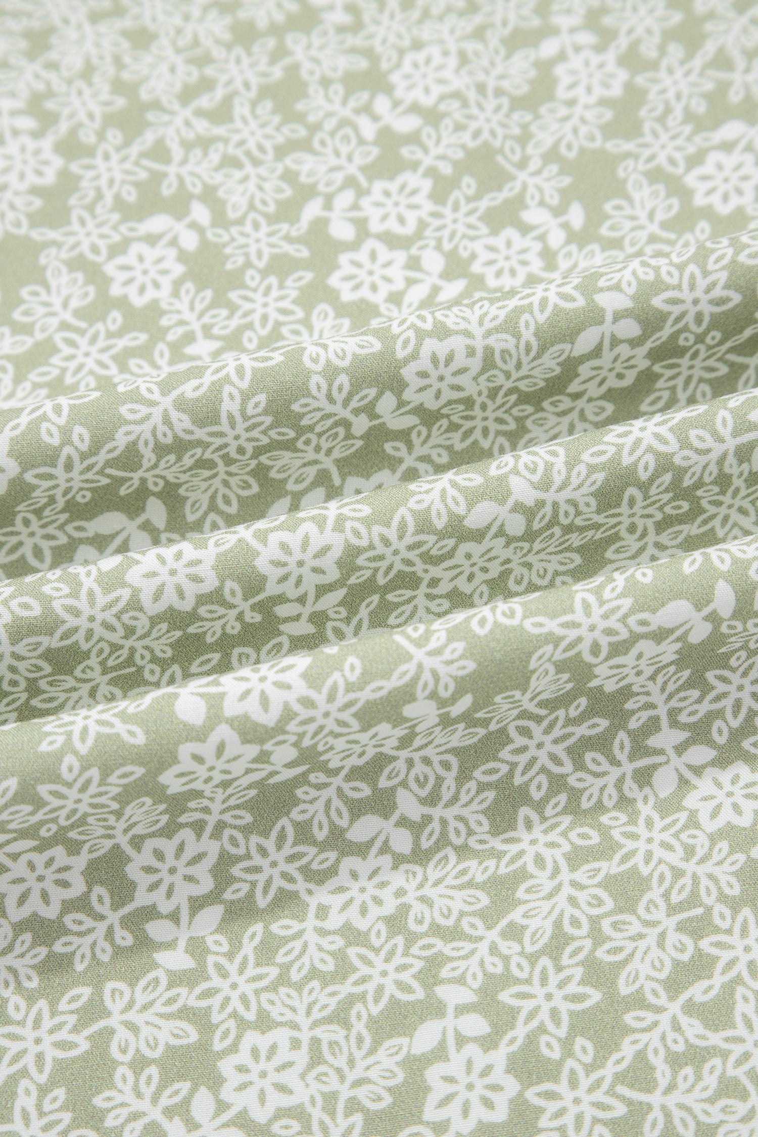 Green Smocked Bodice Square Neck Sleeveless Floral Jumpsuit